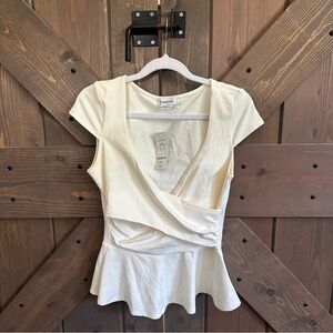 bebe Ivory Wrap Peplum Short Sleeve Top
